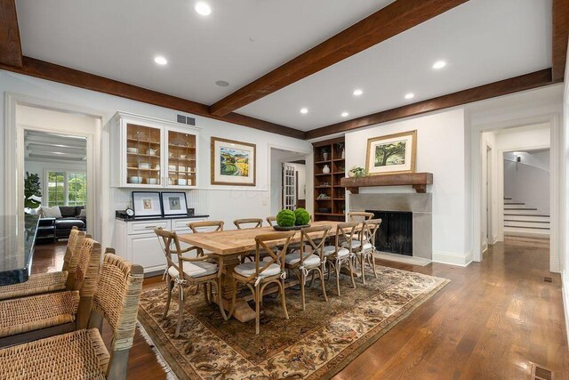 2989 Old Path Rd, Blacklick, OH 43004 - dining space with a fireplace, dark wood-style floors, beamed ceiling, recessed lighting, and stairs