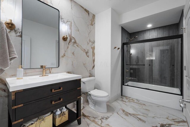 2989 Old Path Rd, Blacklick, OH 43004 - bathroom with marble finish flooring, vanity, toilet, and combined bath / shower with glass door