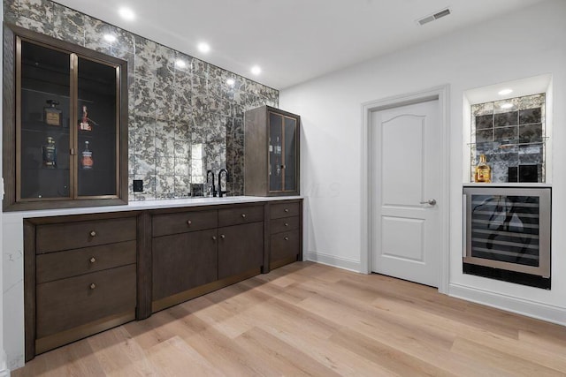 2989 Old Path Rd, Blacklick, OH 43004 - indoor bar with wine cooler, light wood-type flooring, baseboards, and recessed lighting