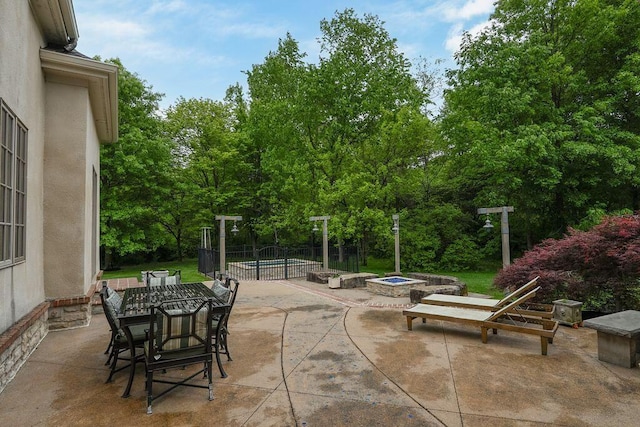 2989 Old Path Rd, Blacklick, OH 43004 - view of patio / terrace with a swimming pool, a fire pit, and outdoor dining area
