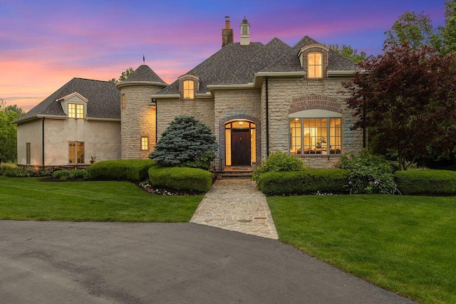 2989 Old Path Rd, Blacklick, OH 43004 - french country inspired facade with stone siding, a chimney, a front yard, and roof with shingles