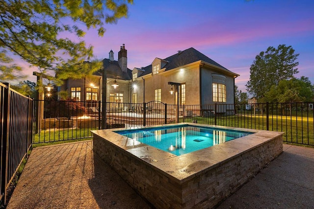 2989 Old Path Rd, Blacklick, OH 43004 - pool at dusk featuring a jacuzzi