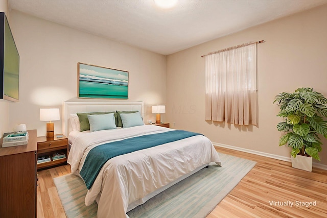 5946 Lisa St, Columbus, OH 43231 - bedroom featuring wood finished floors and baseboards