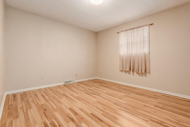5946 Lisa St, Columbus, OH 43231 - unfurnished room with wood finished floors and baseboards
