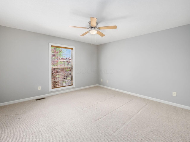 6628 Dalmore Ln, Dublin, OH 43016 - unfurnished room with ceiling fan, light colored carpet, and baseboards
