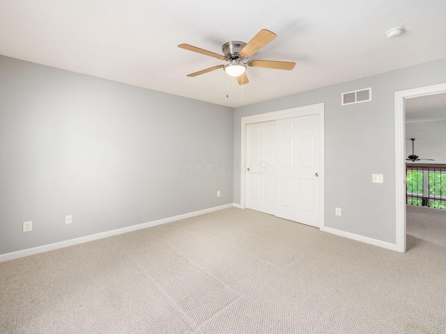 6628 Dalmore Ln, Dublin, OH 43016 - unfurnished bedroom featuring light colored carpet, baseboards, and a closet
