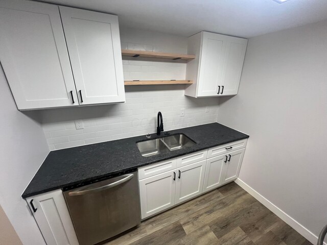 139 Corbins Mill Dr, Dublin, OH 43017 - kitchen featuring a sink, dishwasher, dark wood-style flooring, open shelves, and white cabinets