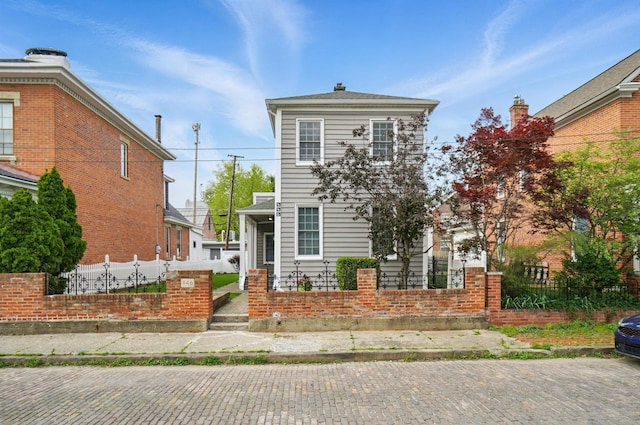 446 E Beck St, Columbus, OH 43206 - view of front facade with a fenced front yard