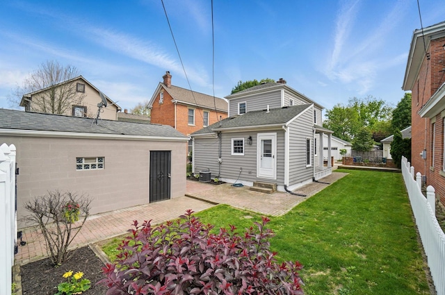 446 E Beck St, Columbus, OH 43206 - rear view of property with entry steps, central AC, and a patio