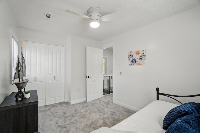 446 E Beck St, Columbus, OH 43206 - carpeted bedroom featuring baseboards, a closet, and ceiling fan