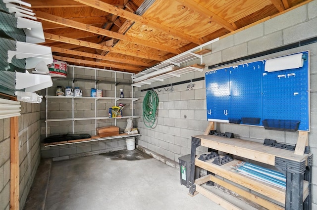 446 E Beck St, Columbus, OH 43206 - below grade area with concrete block wall and a workshop area