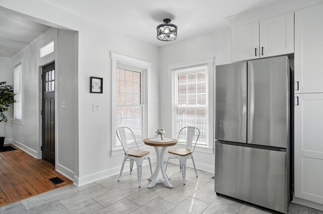 446 E Beck St, Columbus, OH 43206 - dining space featuring baseboards