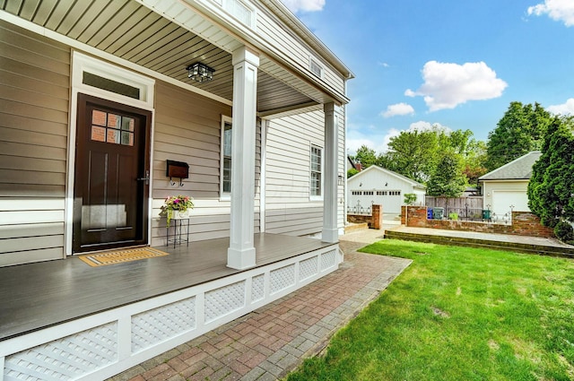 446 E Beck St, Columbus, OH 43206 - view of exterior entry with a yard and a porch