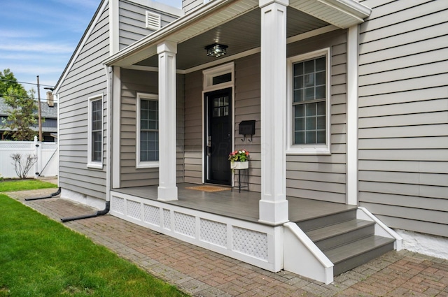 446 E Beck St, Columbus, OH 43206 - property entrance featuring covered porch and fence
