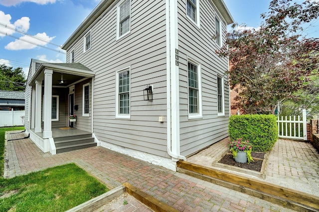 446 E Beck St, Columbus, OH 43206 - view of home's exterior with fence and a patio area