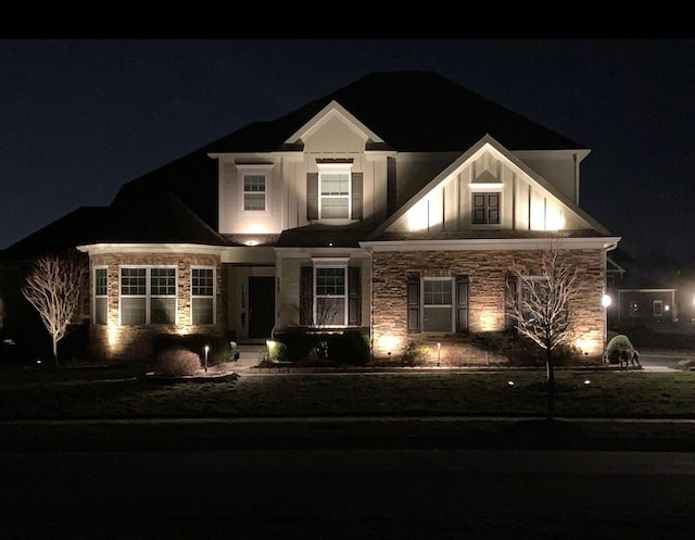 view of front of home with stone siding