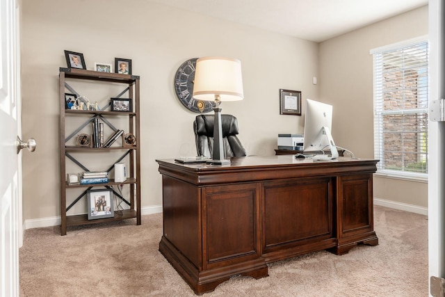 office with light colored carpet and baseboards