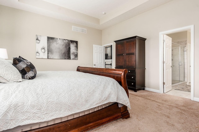 bedroom with light carpet and baseboards