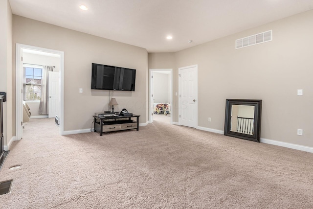 living room with carpet flooring, baseboards, and recessed lighting