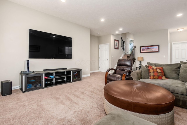 living area with carpet, recessed lighting, stairs, and baseboards