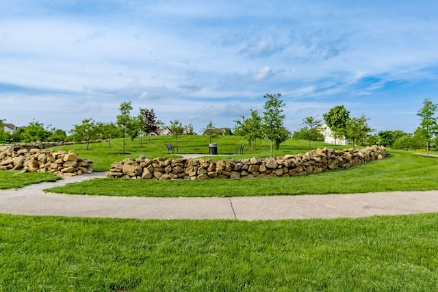 surrounding community with a yard
