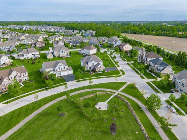 aerial view of property's location with nearby suburban area