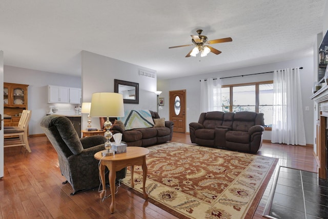 80 Baltimore Somerset Rd NW, Baltimore, OH 43105 - living area featuring a ceiling fan and wood finished floors