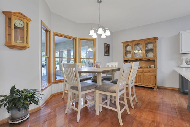 80 Baltimore Somerset Rd NW, Baltimore, OH 43105 - dining space featuring a chandelier, wood finished floors, and baseboards