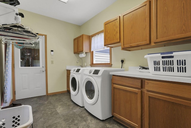 80 Baltimore Somerset Rd NW, Baltimore, OH 43105 - laundry area featuring cabinet space, independent washer and dryer, and baseboards