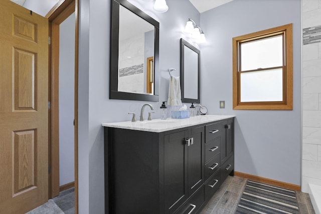 80 Baltimore Somerset Rd NW, Baltimore, OH 43105 - bathroom with double vanity and baseboards
