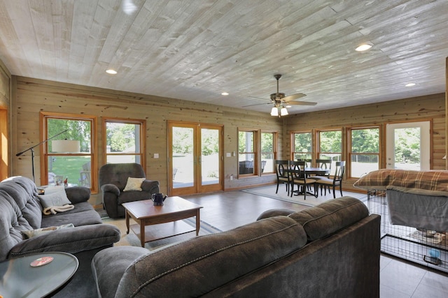 80 Baltimore Somerset Rd NW, Baltimore, OH 43105 - living room featuring plenty of natural light, a ceiling fan, wooden walls, recessed lighting, and french doors