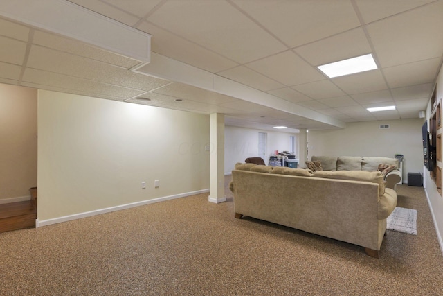 80 Baltimore Somerset Rd NW, Baltimore, OH 43105 - carpeted living room featuring a drop ceiling and baseboards