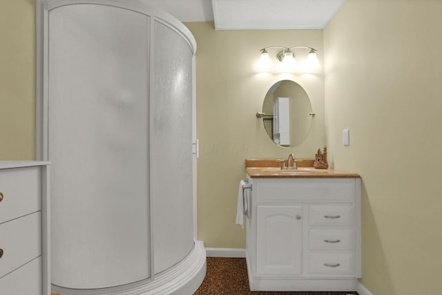 80 Baltimore Somerset Rd NW, Baltimore, OH 43105 - bathroom featuring baseboards, vanity, and a stall shower