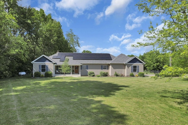 80 Baltimore Somerset Rd NW, Baltimore, OH 43105 - ranch-style home featuring roof mounted solar panels, a front lawn, and roof with shingles