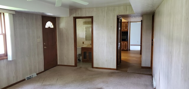 4993 Shadycrest Rd, Columbus, OH 43229 - foyer entrance featuring carpet, a ceiling fan, and baseboards