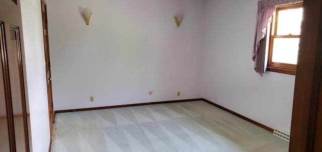 4993 Shadycrest Rd, Columbus, OH 43229 - unfurnished room featuring light colored carpet and baseboards