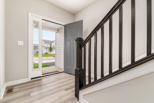 417 Oakland Hills Loop, Commercial Point, OH 43116 - foyer featuring light wood-style floors, baseboards, and stairs