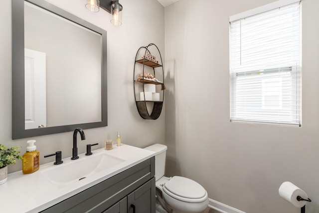417 Oakland Hills Loop, Commercial Point, OH 43116 - half bath featuring toilet, vanity, and plenty of natural light