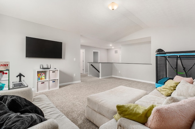 417 Oakland Hills Loop, Commercial Point, OH 43116 - carpeted living room featuring vaulted ceiling and baseboards
