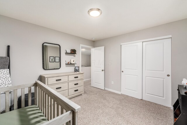 417 Oakland Hills Loop, Commercial Point, OH 43116 - bedroom featuring light carpet, a closet, and baseboards