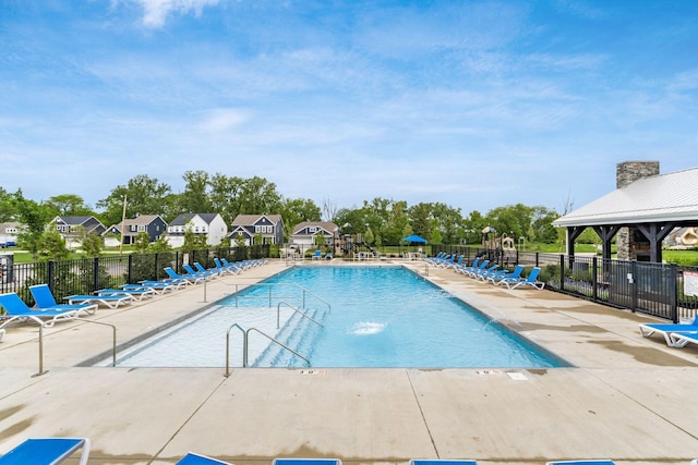 417 Oakland Hills Loop, Commercial Point, OH 43116 - community pool featuring a patio, a gazebo, and a residential view