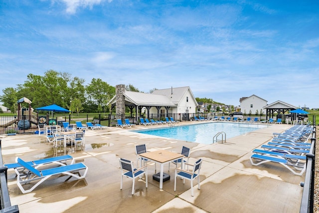 417 Oakland Hills Loop, Commercial Point, OH 43116 - community pool featuring a gazebo and a patio area