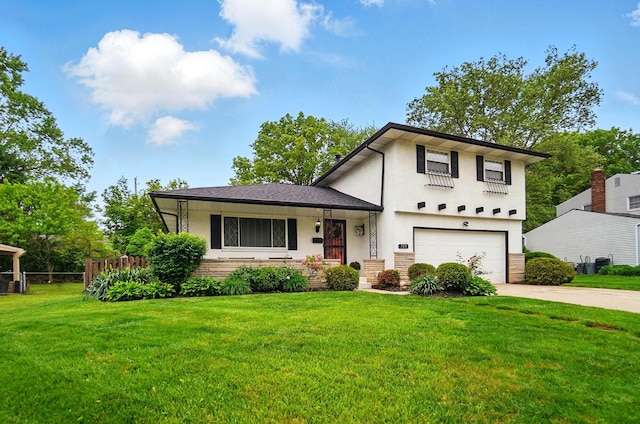 723 W Winmar Pl, Westerville, OH 43081 - tri-level home with a garage, stucco siding, and concrete driveway