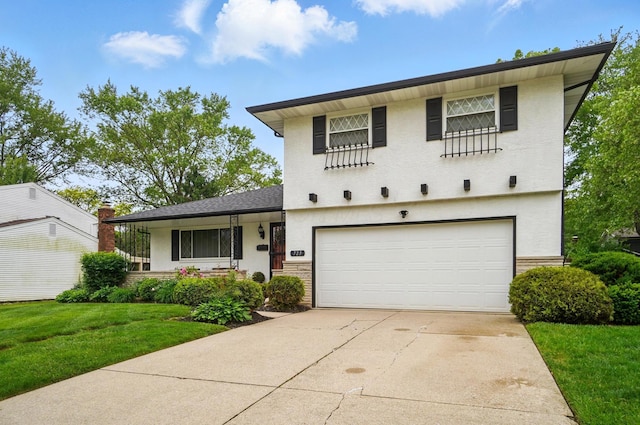 723 W Winmar Pl, Westerville, OH 43081 - view of front of house featuring concrete driveway, a front lawn, stucco siding, and an attached garage