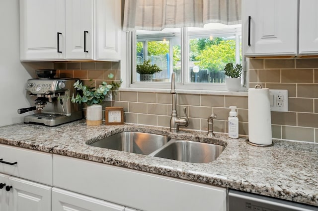 723 W Winmar Pl, Westerville, OH 43081 - kitchen featuring a sink, white cabinetry, dishwasher, and backsplash