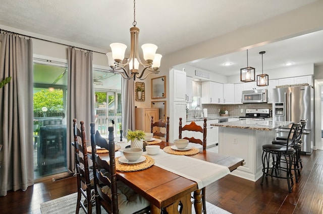 723 W Winmar Pl, Westerville, OH 43081 - dining room with dark wood-type flooring and a chandelier