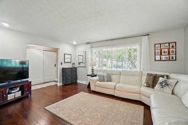723 W Winmar Pl, Westerville, OH 43081 - living area with dark wood-style flooring, recessed lighting, a textured ceiling, and baseboards