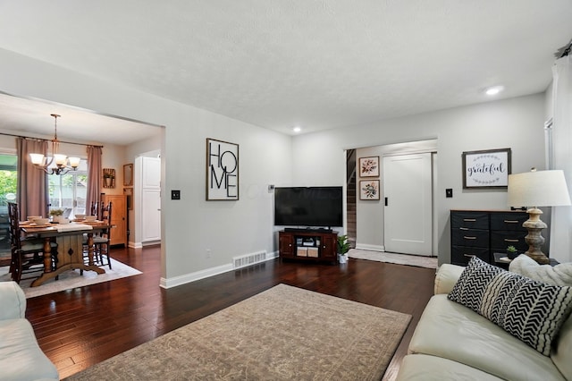 723 W Winmar Pl, Westerville, OH 43081 - living room with a chandelier, wood finished floors, baseboards, and recessed lighting