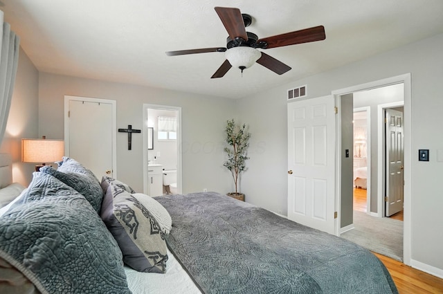 723 W Winmar Pl, Westerville, OH 43081 - bedroom featuring light wood finished floors, ensuite bathroom, baseboards, and ceiling fan