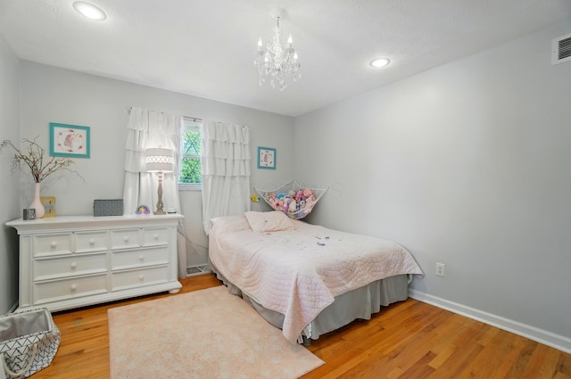 723 W Winmar Pl, Westerville, OH 43081 - bedroom with light wood-type flooring, a chandelier, recessed lighting, and baseboards
